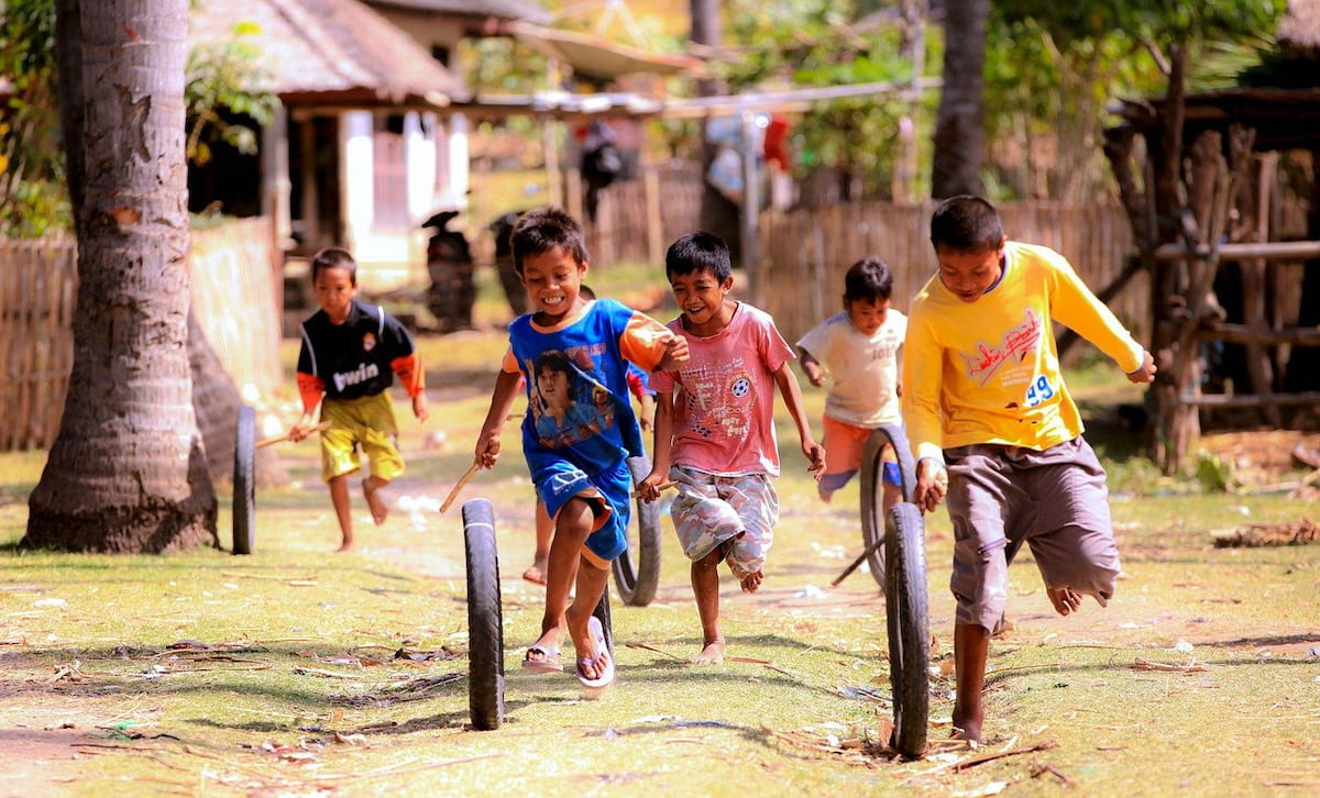 children playing with tires